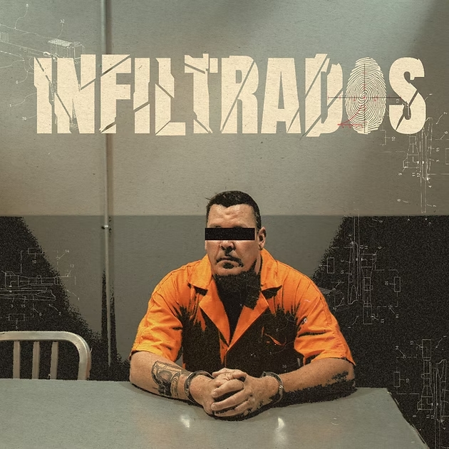 Infiltrados movie poster with man in orange prison uniform sitting at table