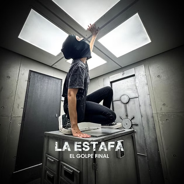 La Estafa movie poster with person in dark room kneeling on table under skylight